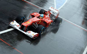 Fernando Alonso, Commanding The Wet Track Wallpaper