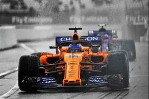 Fernando Alonso Driving A Mclaren Formula 1 Car Wallpaper