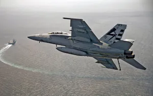 Fighter Plane Over Sea Wallpaper