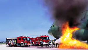 Firefighters Saving An Aircraft Wallpaper