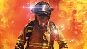 Fireman Against A Huge Fire Wallpaper