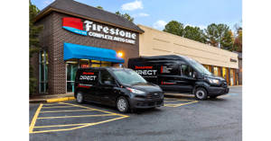 Firestone Shop With Cars On Parking Lot Wallpaper