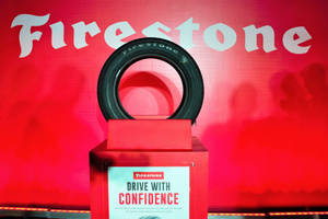 Firestone Tire With Red And White Background Wallpaper