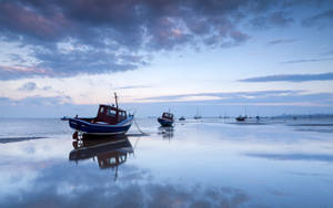 Fishing Boat At Low Tide Wallpaper