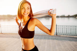 Fit Woman Smiling Wallpaper