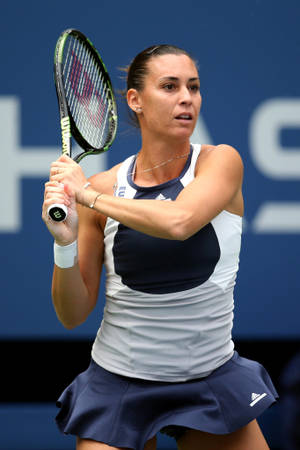 Flavia Pennetta Gripping Tennis Racket Wallpaper