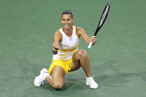 Flavia Pennetta In Action On The Tennis Court Wallpaper