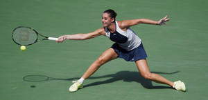 Flavia Pennetta Playing Tennis Wallpaper