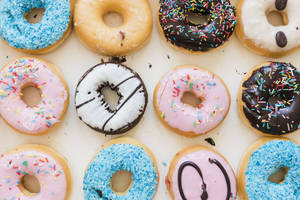 Flavorful Mixed Donuts Wallpaper