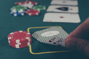 Flipping An Ace-king Of Hearts In A Baccarat Game Wallpaper