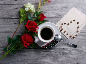 Flowers And A Coffee Cup Wallpaper