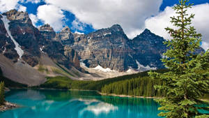 Fluffy Clouds At Rocky Mountain National Park Wallpaper