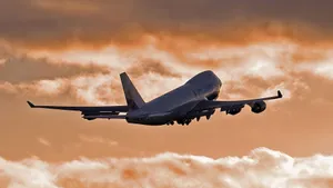 Flying United Airplane During Sunset Wallpaper