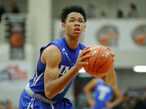 Focused Basketball Player Free Throw Wallpaper