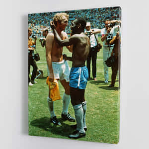 Football Athletes Bobby Moore And Pelé Wallpaper