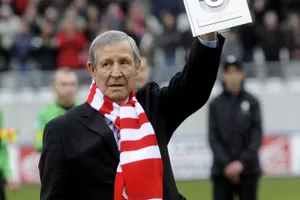 Football Legend Saluting Crowd Wallpaper