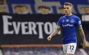 Football Player Lucas Digne Walking Wallpaper