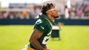 Football Player Sideline Profile Wallpaper