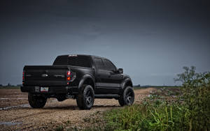 Ford Raptor In Matte Black Color Wallpaper