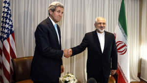 Former U.s. Secretary Of State, John Kerry, In Discussion With Iran's Foreign Minister Wallpaper