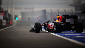 Formula 1 Desktop Racecar On Road Wallpaper