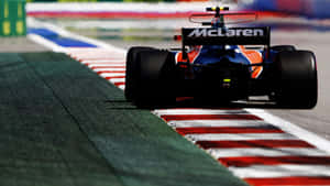 Formula 1 Race Car Hits The Track Wallpaper