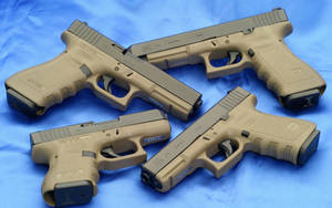 Four Army Green Glocks Wallpaper