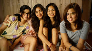 Four Teenage Sisters Picture Together Wallpaper