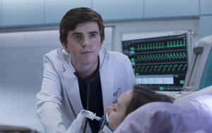 Freddie Highmore With Patient Wallpaper