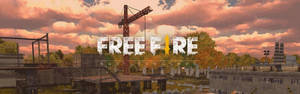 Free Fire Banner In Open Grounds Wallpaper