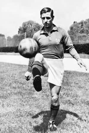 French Footballer Raymond Kopa Keeping The Ball Alive Wallpaper