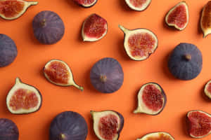 Fresh Figs Orange Background Wallpaper