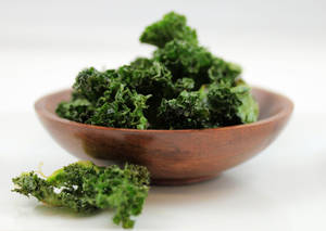 Fresh Green Kale Leaves On White Background Wallpaper