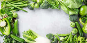 Fresh Green Vegetables Displayed In A Beautiful Frame Wallpaper