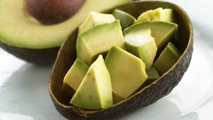 Freshly Sliced Avocado Fruit Close Up Shot Wallpaper