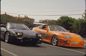 From The Streets Of Los Angeles To The Thrill Of Rio De Janeiro, The Fast & Furious Franchise Takes You On An Unforgettable Journey. Wallpaper