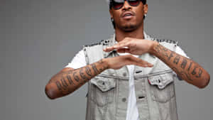 Future Rapper Pfp With Arm Tattoos Wallpaper
