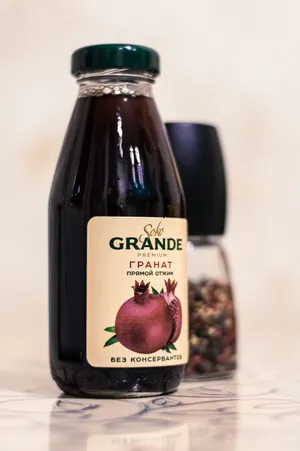 Garnet Fruit Juice Bottle Wallpaper