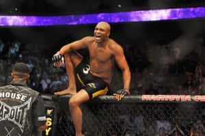 Gary Goodridge Winning Moment In Octagon Ring Wallpaper