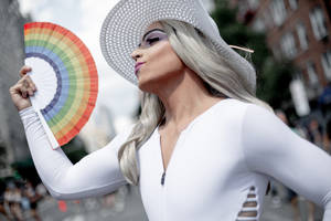 Gay With Rainbow Fan Wallpaper