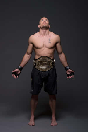 Georges St-pierre Looking Up Photoshoot Wallpaper