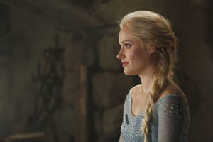 Georgina Haig Embodying The Character Of Elsa In A Stunning Icy Blue Ensemble Wallpaper