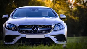 Get Behind The Wheel Of Luxury With A Mercedes Benz Wallpaper