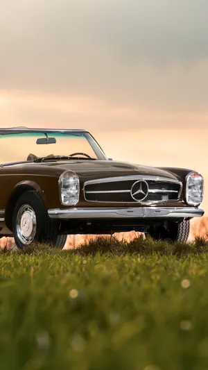 Get Ready To Cruise In Style With This Vintage Car Iphone Wallpaper