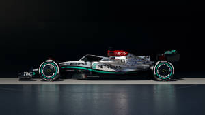 Get Ready To Feel The Thrill Of The Mercedes F1 Racing With This Iphone Wallpaper