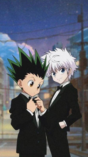 Get Ready To Join Gon And His Friends On Their Epic Adventure With The Hunter X Hunter Iphone. Wallpaper