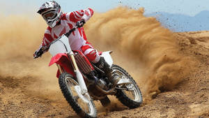 Get Ready To Ride In Style With Fox Dirt Bike Wallpaper