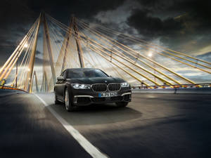 Get Ready To Take The Wheel Of The Luxurious Bmw M760li Xdrive Wallpaper