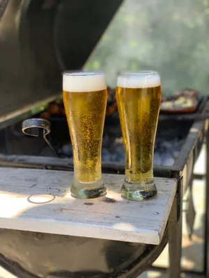 Get The Party Started With An Ice Cold Beer And Delicious Bbq Wallpaper