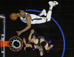 Giannis Antetokounmpo Aerial Dunk Shot Wallpaper